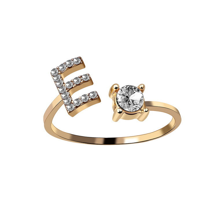 Initial letter ring, side view of the open adjustable band