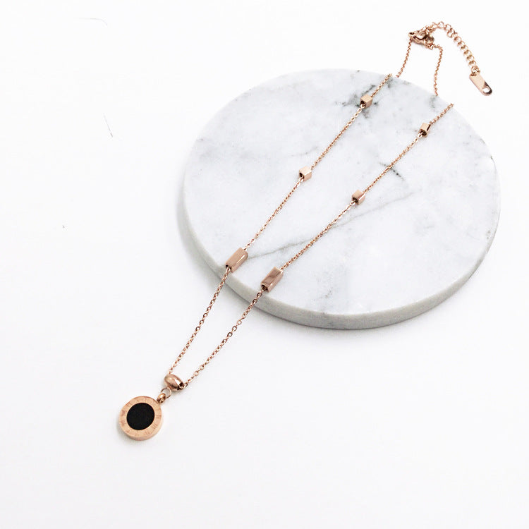 Reversible Roman numeral pendant necklace, black face detail