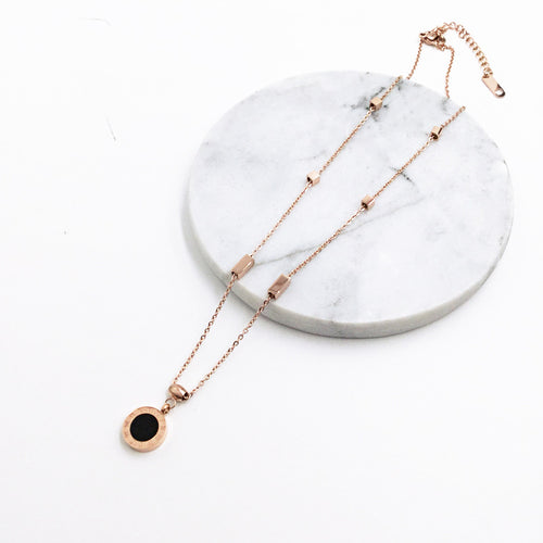 Reversible Roman numeral pendant necklace, black face detail