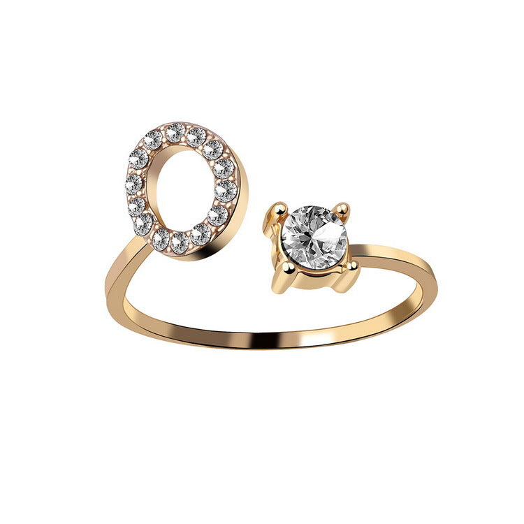 Rose gold initial letter ring with zirconia stones