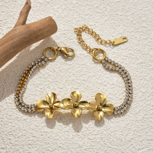 18K gold-plated stainless steel flower bracelet worn on the wrist