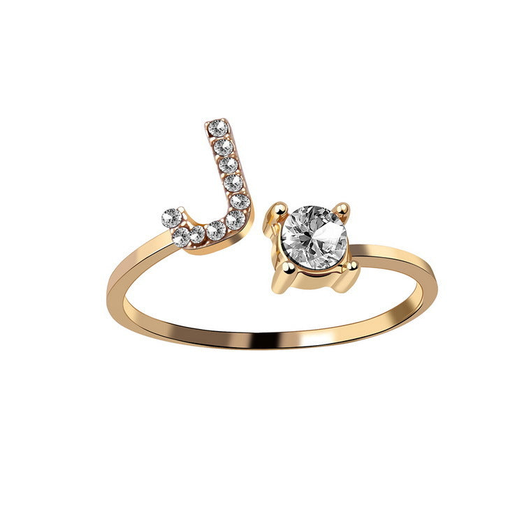 Initial letter ring with zirconia set across the letter