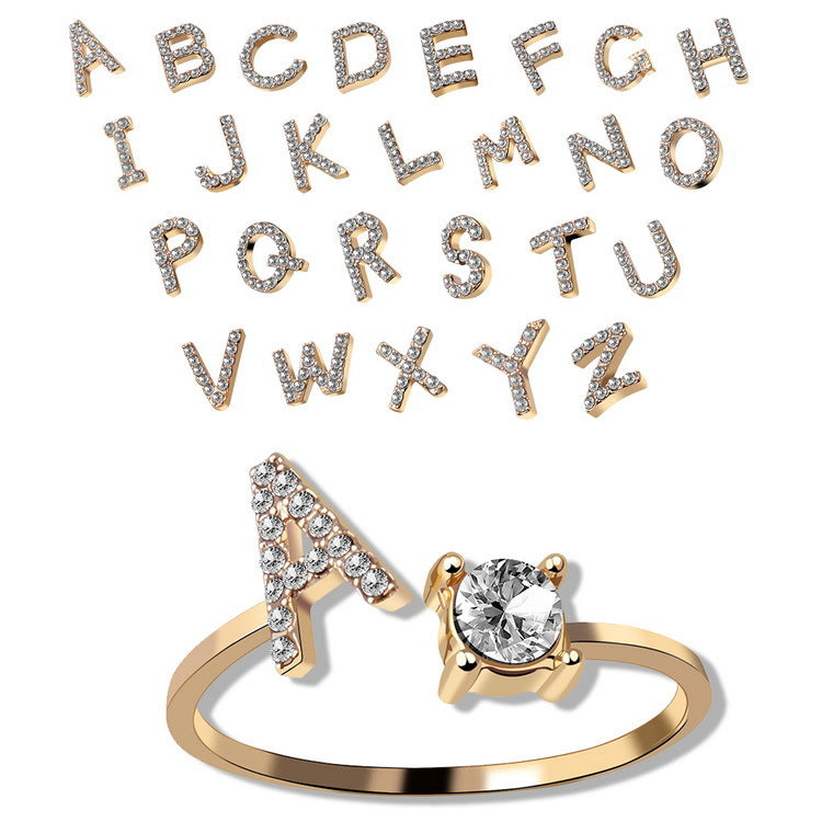 Gold initial letter ring with zirconia stones, adjustable band
