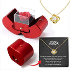 Apple gift box with four-leaf clover necklace, styled shot