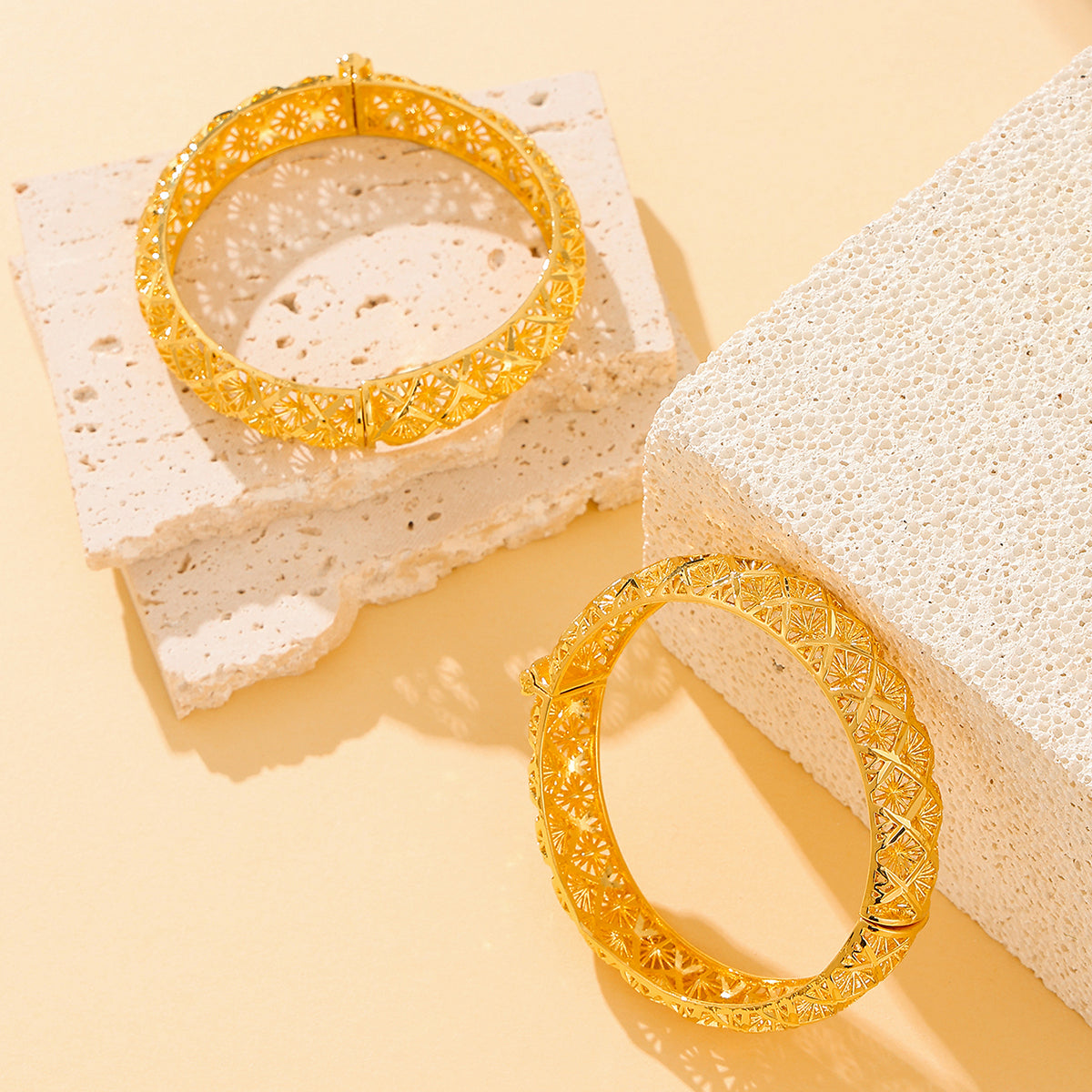 Polished gold finish detail of the four-leaf clover bracelet