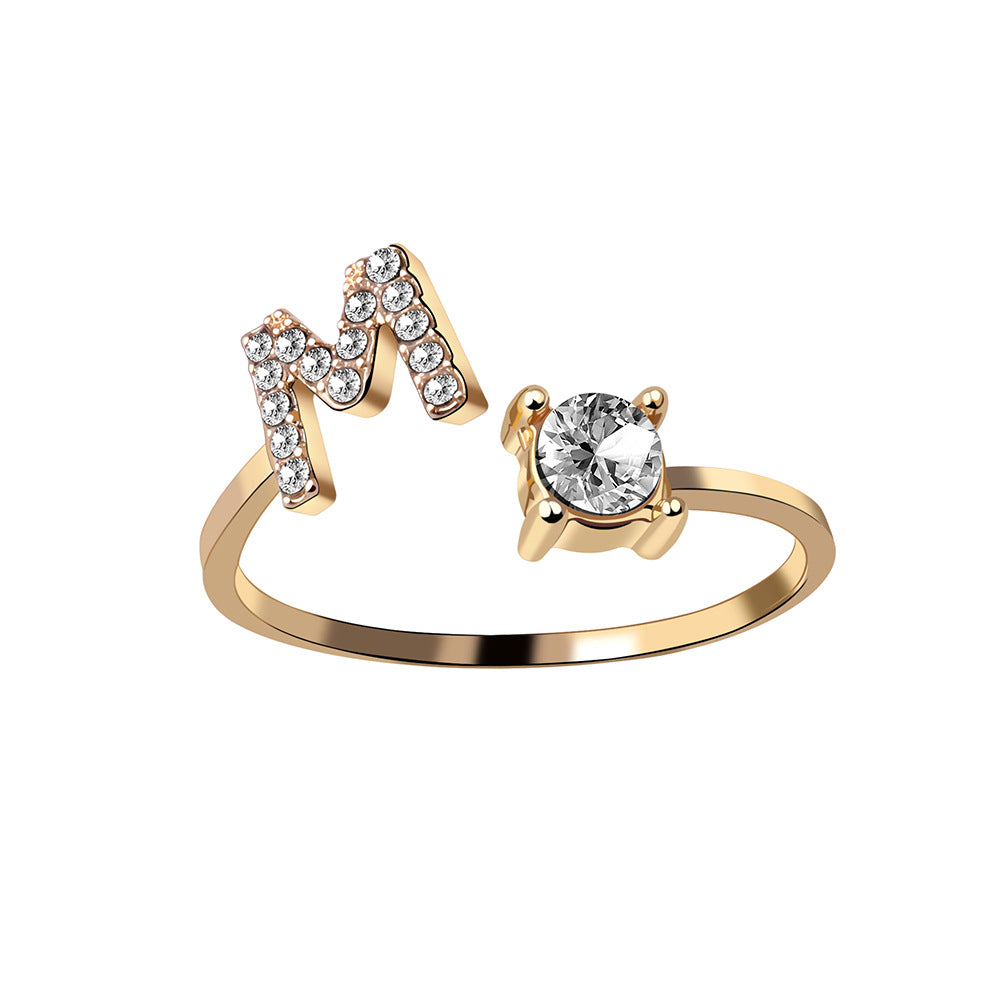 Initial letter ring with zirconia, angled view