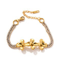 18K gold-plated flower bracelet styled on the wrist