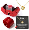 Apple gift box with clover necklace, angled view