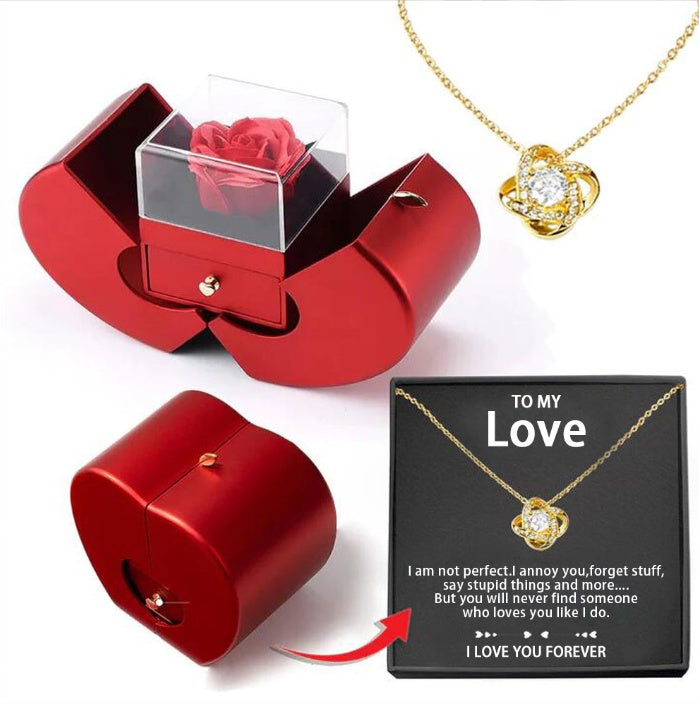 Apple gift box with clover necklace, angled view