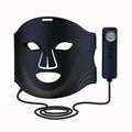Cordless 7-color LED light therapy face mask in black, front view